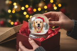 have a image of a box unboxing a snowglobe with excitement. make the globe have a christmas photo of a pet inside. make the photo fill up the snow globe
